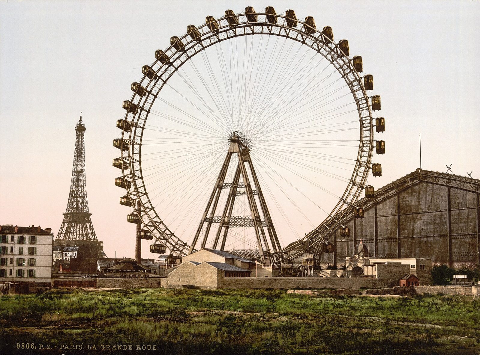Fargelagt fotografi av det 100 meter høye pariserhjulet La Grande Roue med Eiffeltårnet i bakgrunnen